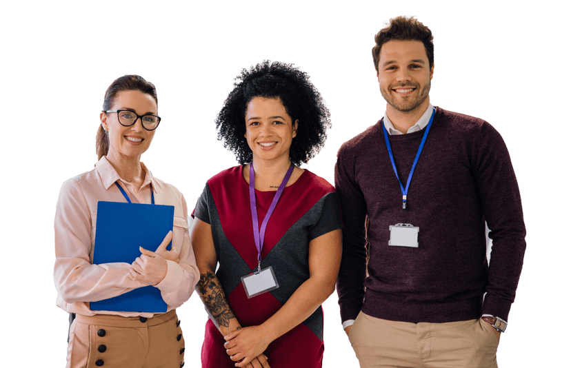 Three smiling professionals with name badges, standing together.
